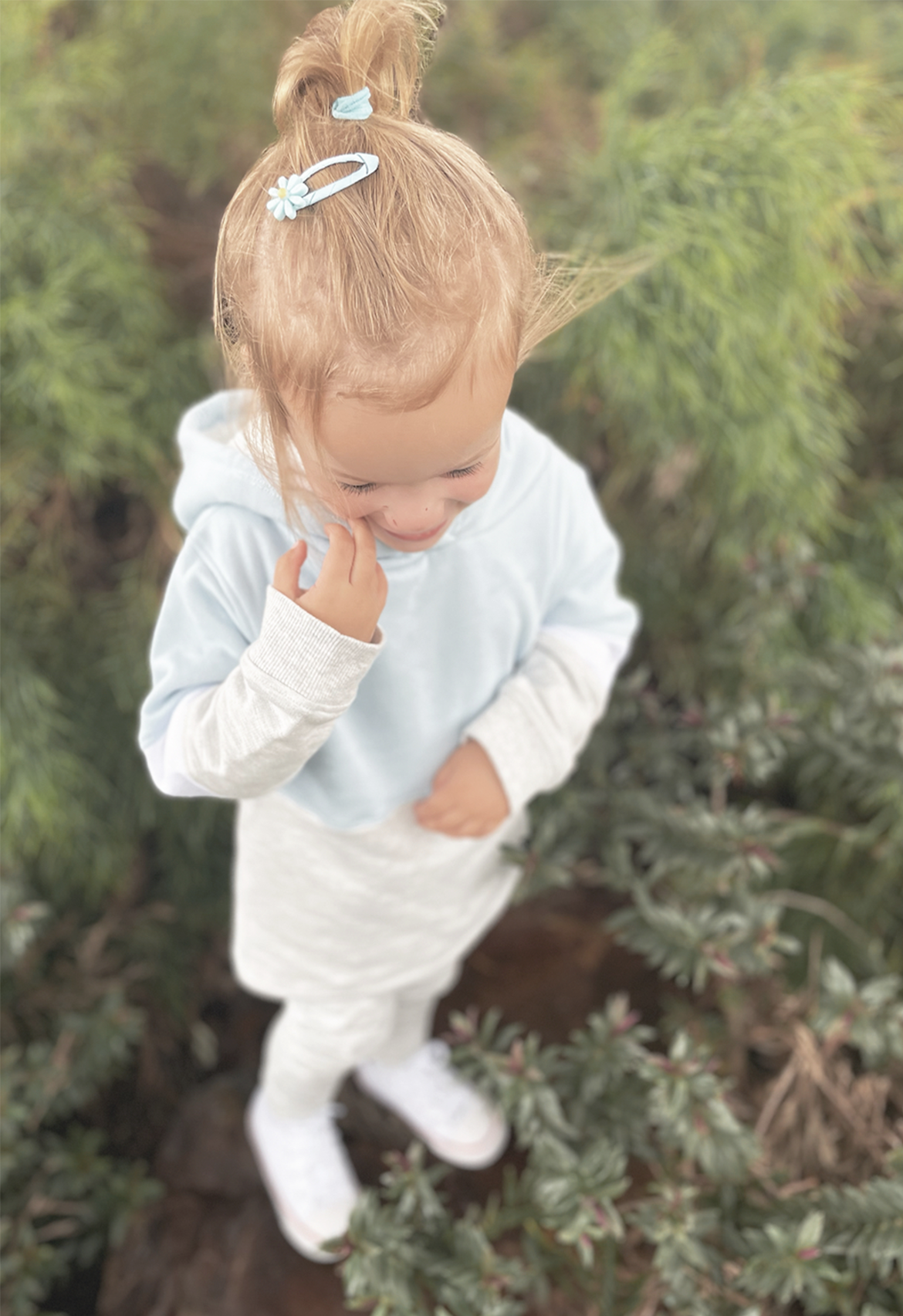 toddler wearing baby blue and grey block tracksuit