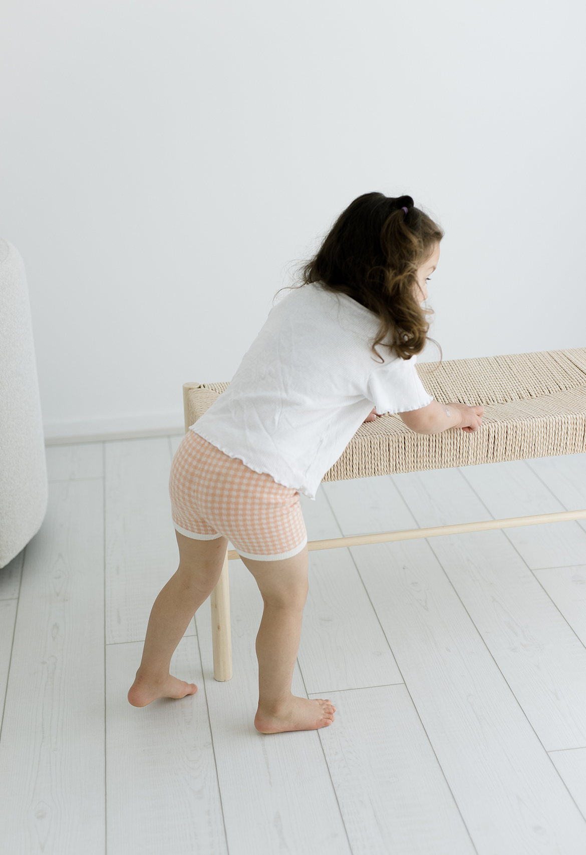 girls wearing peach gingham short