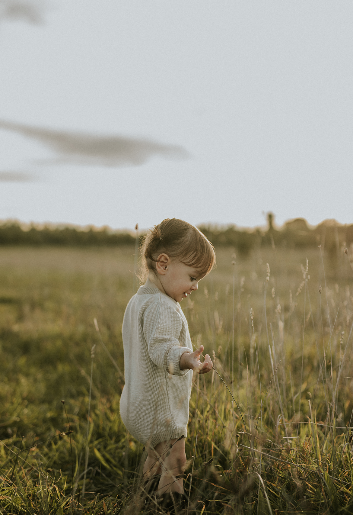 baby and toddler romper in fields