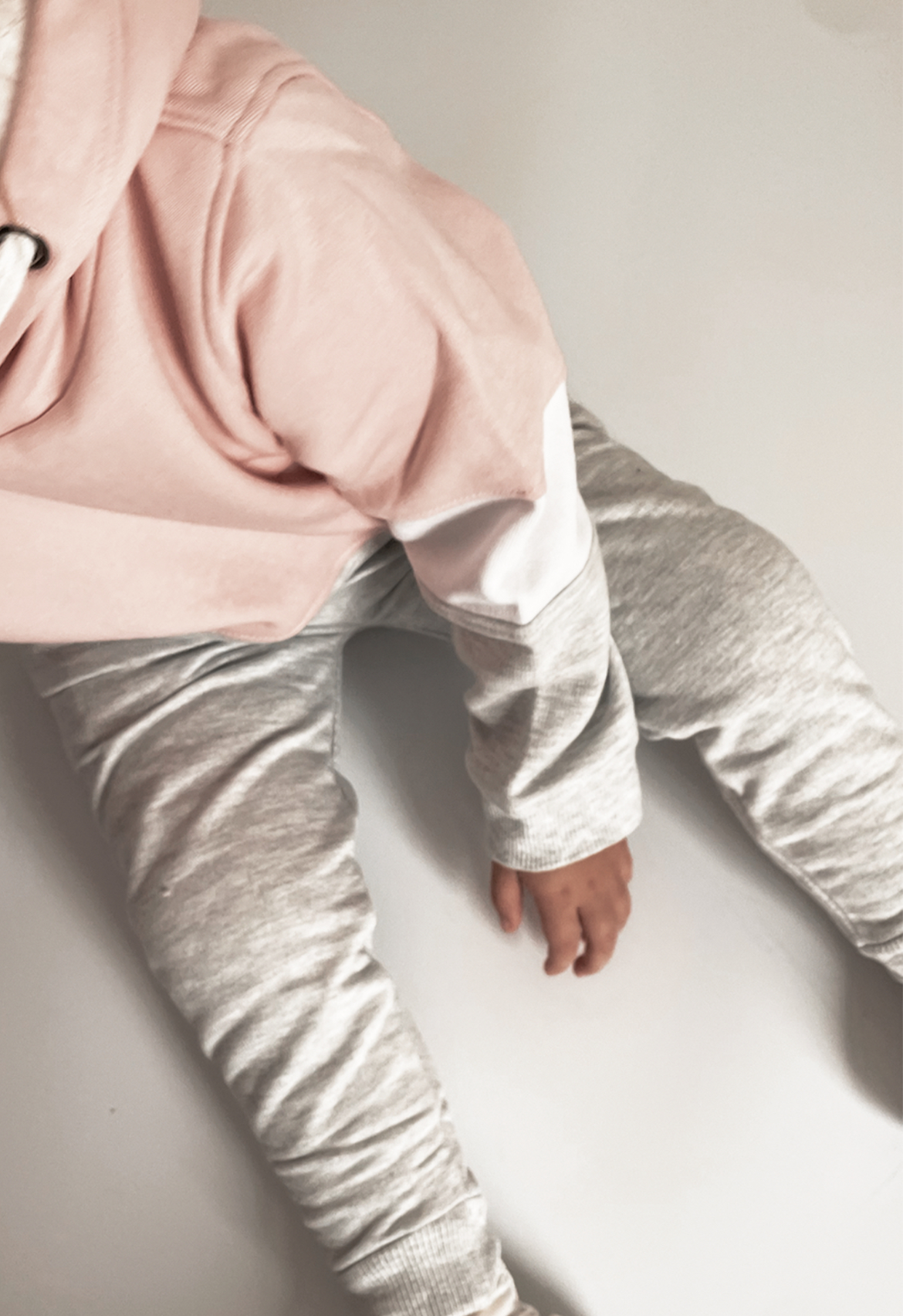 girl wearing tracksuit pant 